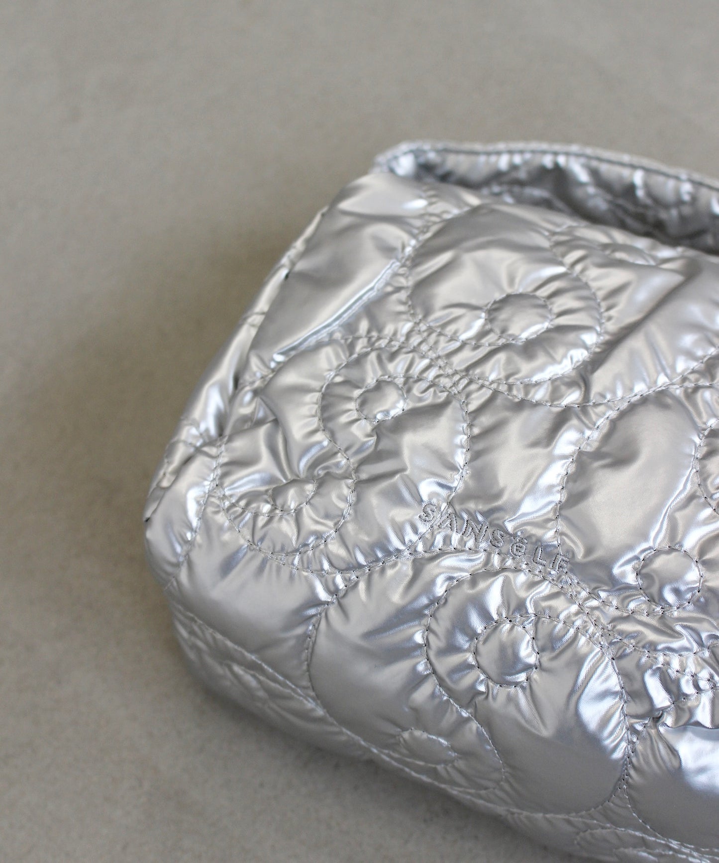 Së metallic pouch bag sana24a009