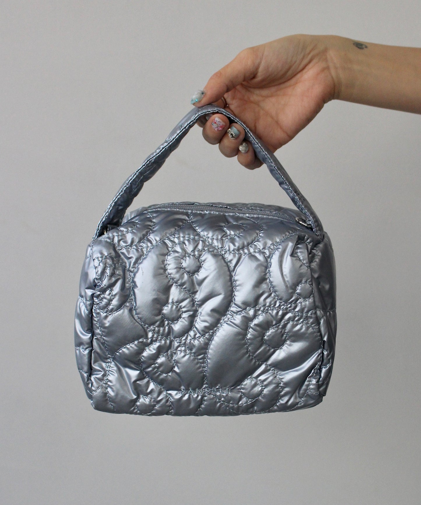 Së metallic pouch bag sana24a009